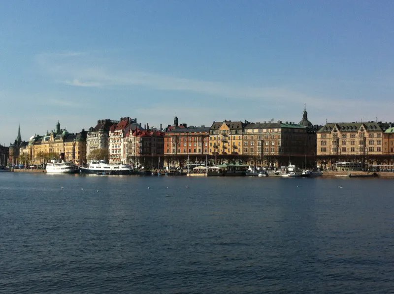 Facades of central Stockholm along the water on a clear spring day